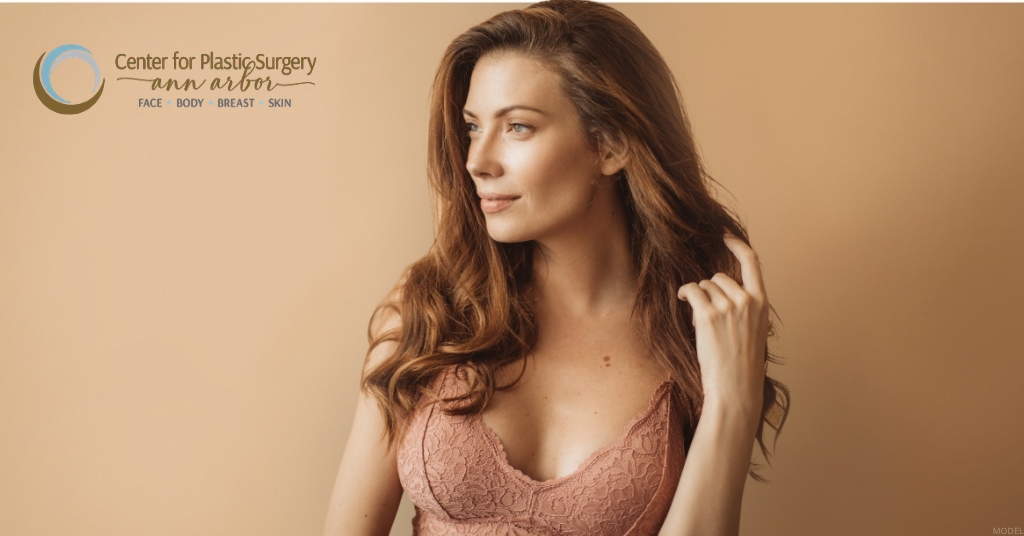 Woman after breast augmentation (model)